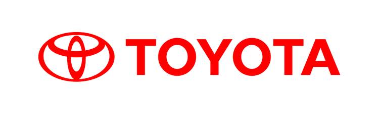 The image shows the Toyota logo, featuring a red stylized oval emblem next to the word "TOYOTA" in bold red capital letters on a white background.